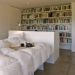 shelf in the bedroom for books