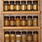 spice shelf with gold jars