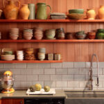 shelves in the kitchen for dishes