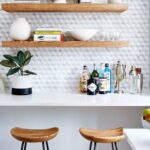 shelves above the table in the kitchen