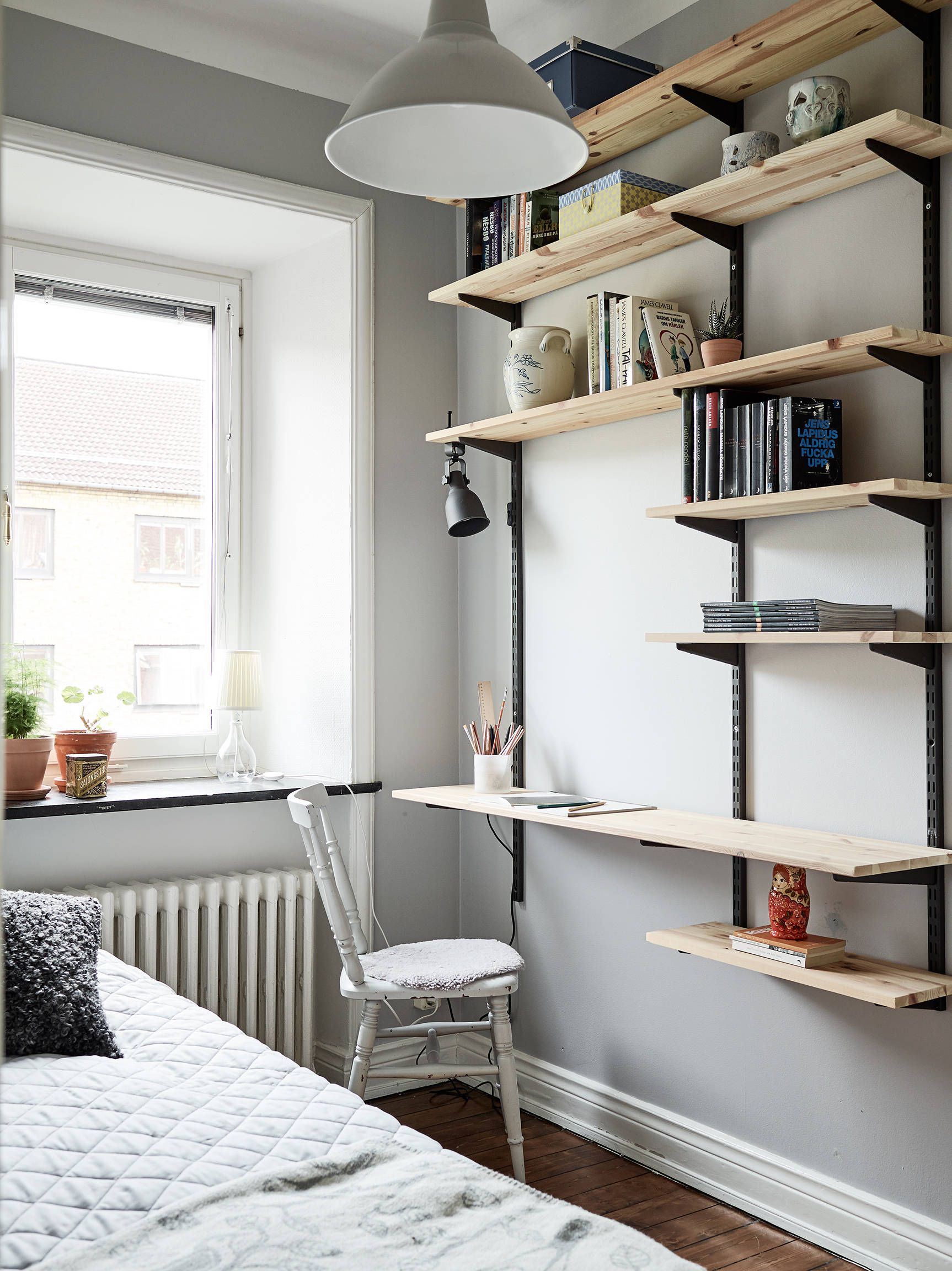 tiered shelves above the table