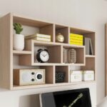 shelf above the table with a clock