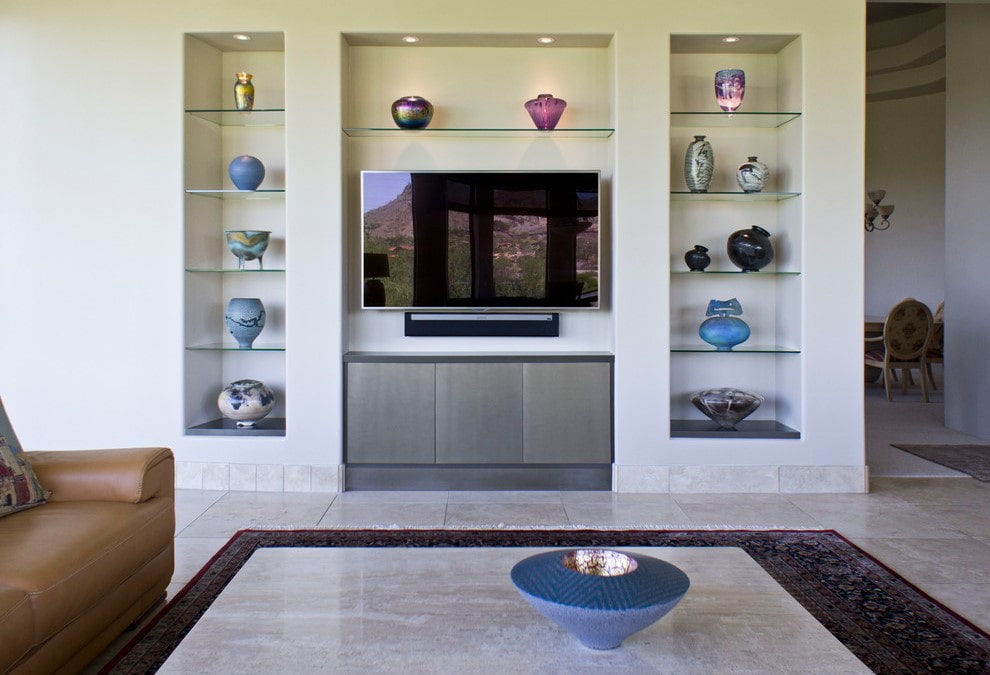 shelves in a niche in the living room