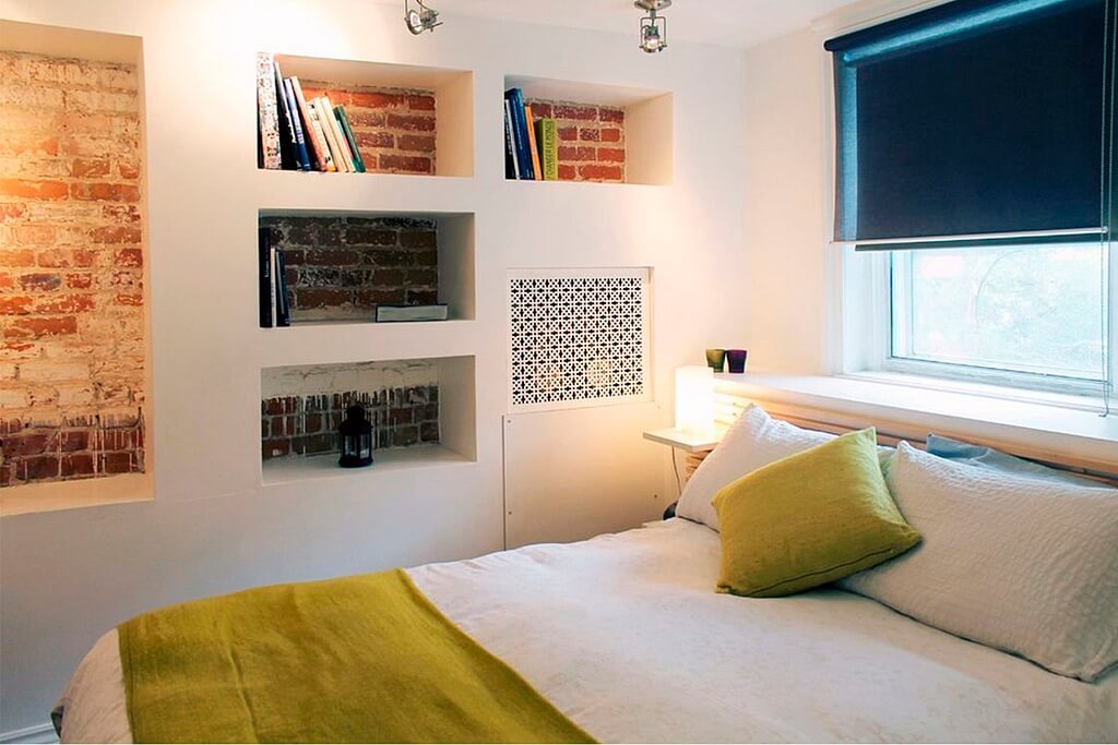 shelves in a niche in the bedroom