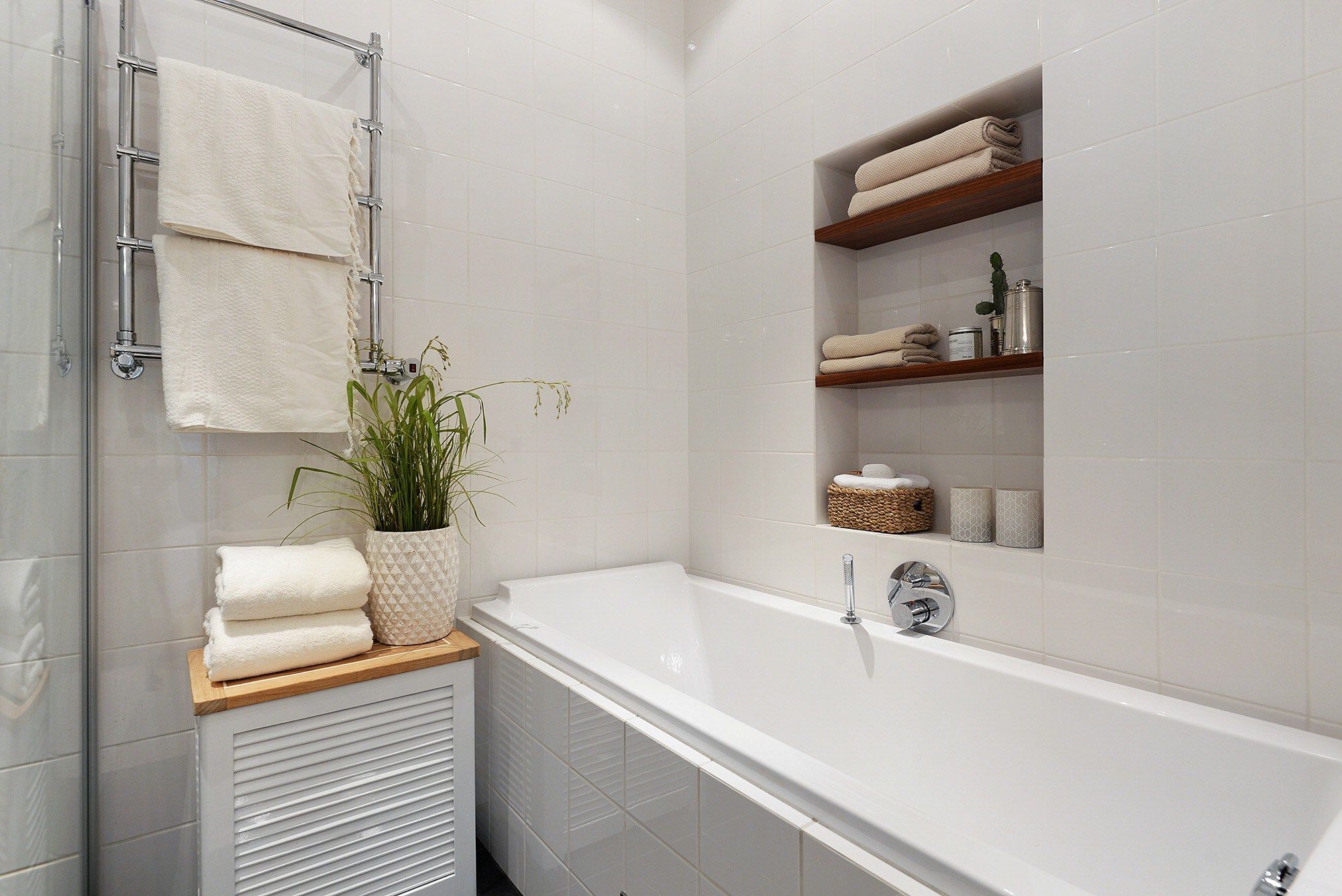 shelves in a niche in the bathroom