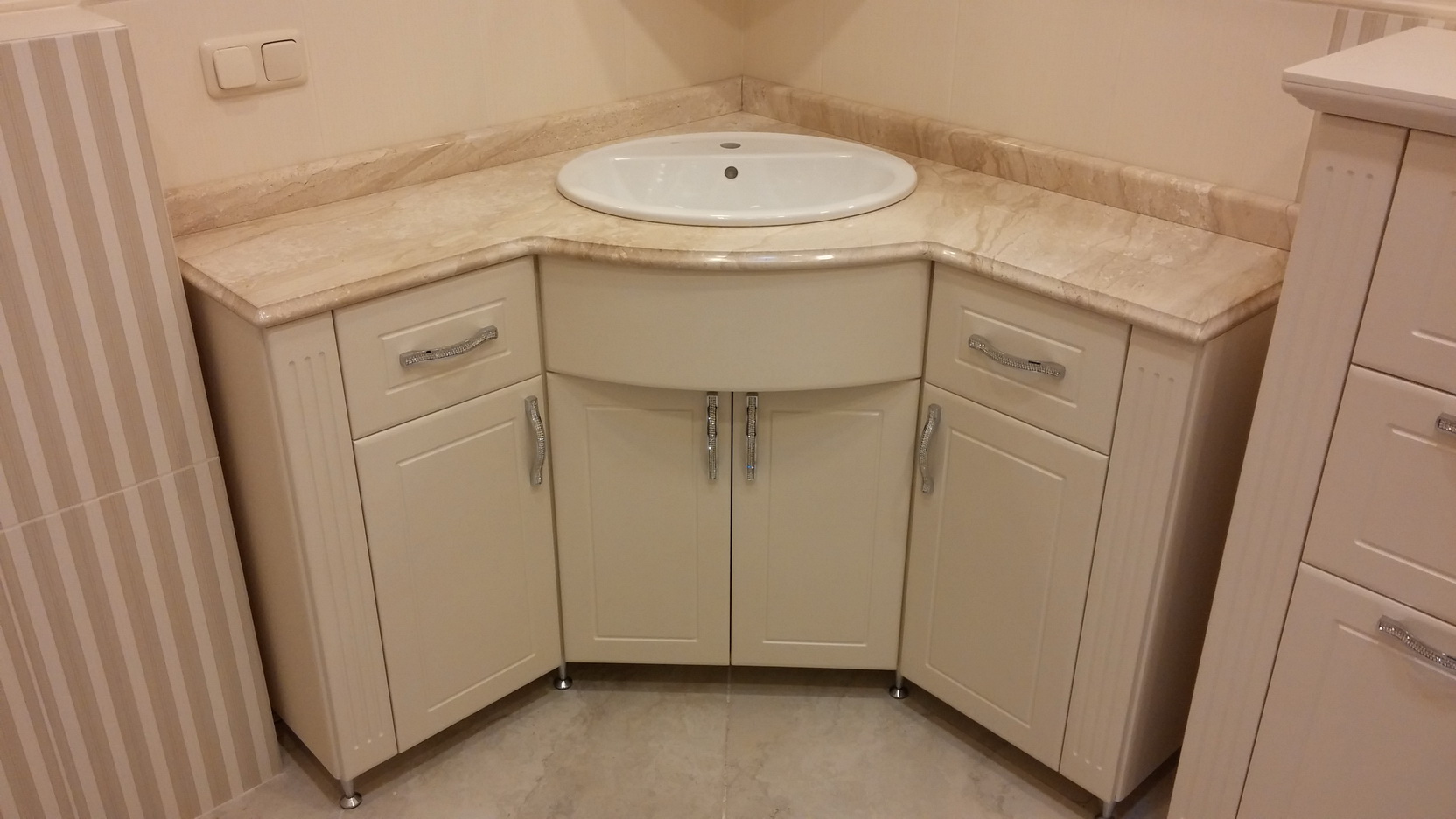 sink with a vanity unit in the bathroom