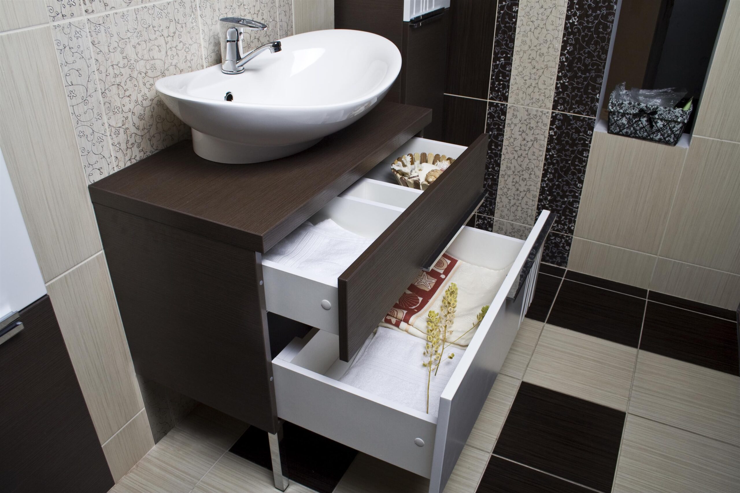 sink with a vanity unit in the bathroom