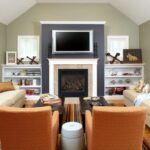 living room with orange armchairs