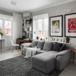 living room with gray corner sofa