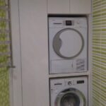 wardrobe above the washing machine photo decoration