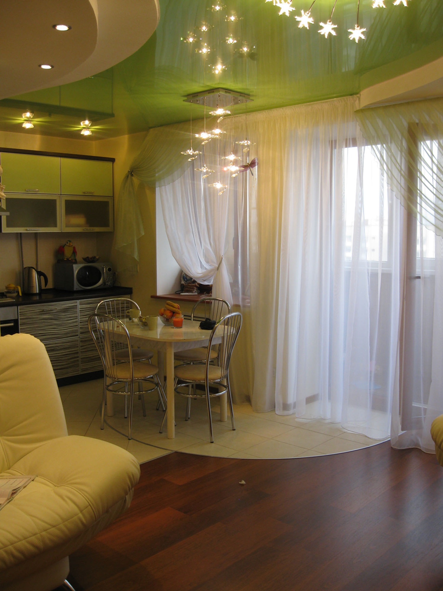 asymmetric curtains in the kitchen