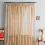 mesh curtains with an armchair