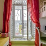 curtains in a room with a balcony door photo interior