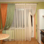 curtains in a room with a balcony door interior photo