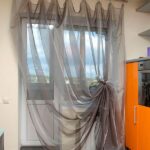 curtains in a room with a balcony door interior ideas