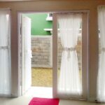 curtains in a room with a balcony door types of decoration