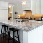 kitchen countertop with black chairs