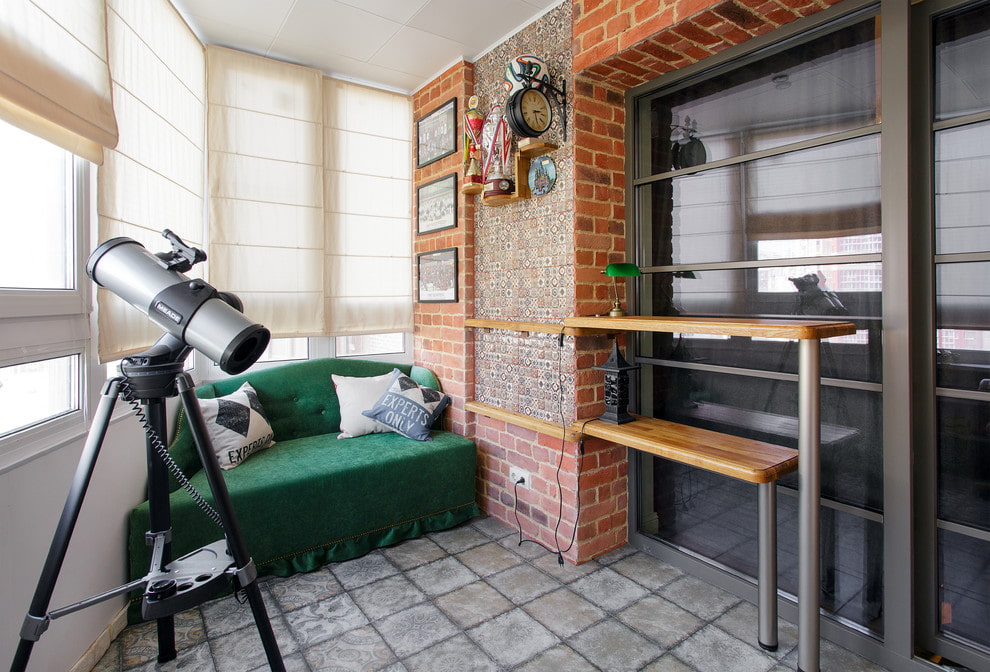 dark green sofa on the loggia