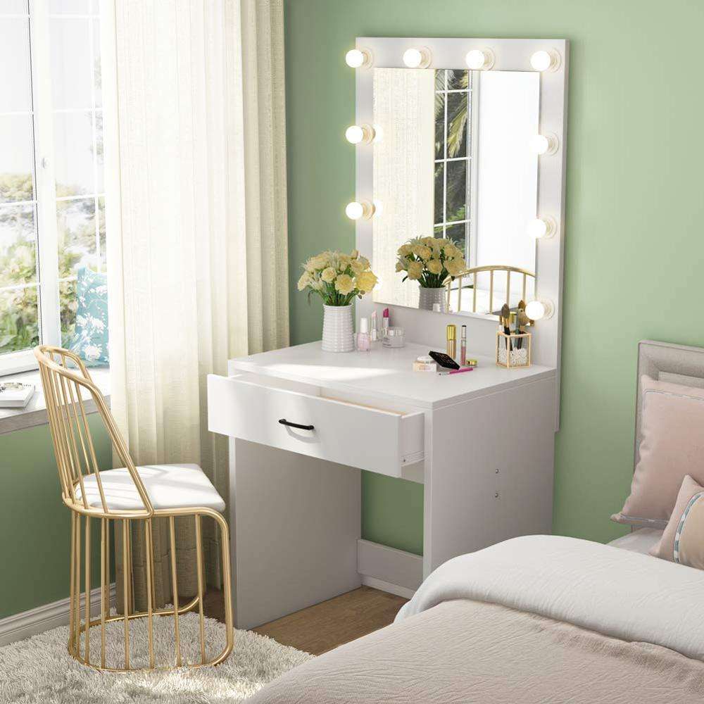 dressing table by the bed