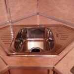 corner cabinet under the sink in the kitchen photo interior