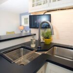 corner cabinet under the sink in the kitchen design photo