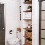 built-in wardrobe in the bathroom with drawers