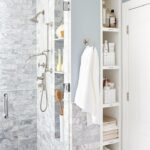 built-in wardrobe in the bathroom with a bathrobe