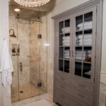 built-in glass wardrobe in the bathroom