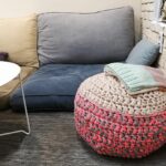 knitted pouf near the sofa