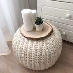 knitted pouf with candles