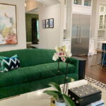 green sofa in the interior photo