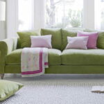 green sofa in the interior photo options