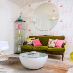 green sofa in the interior photo species