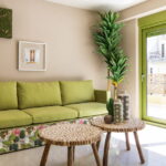 green sofa in the interior design photo