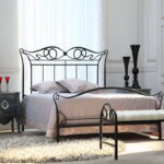 wrought-iron bed with headboard