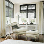 white curtains with roller blinds