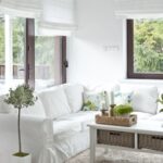 white roman curtains in the living room