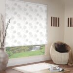 white roller blinds with a pattern