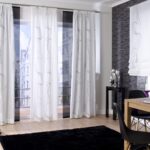 white curtains with black carpet