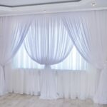 white curtains with tiebacks