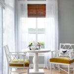 white curtains with brown blinds