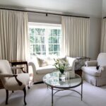 beige curtains with round table