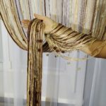 beige curtains muslin thread