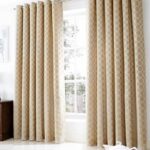 beige curtains with a pattern