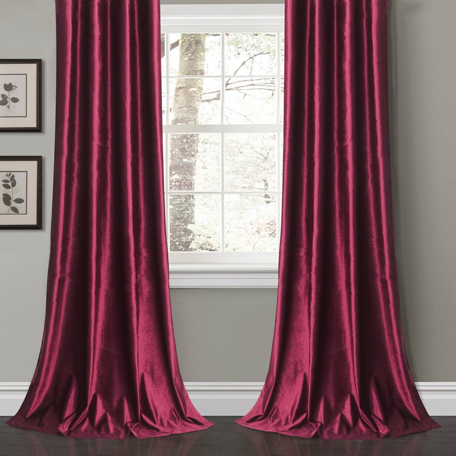 Burgundy curtains in the photo