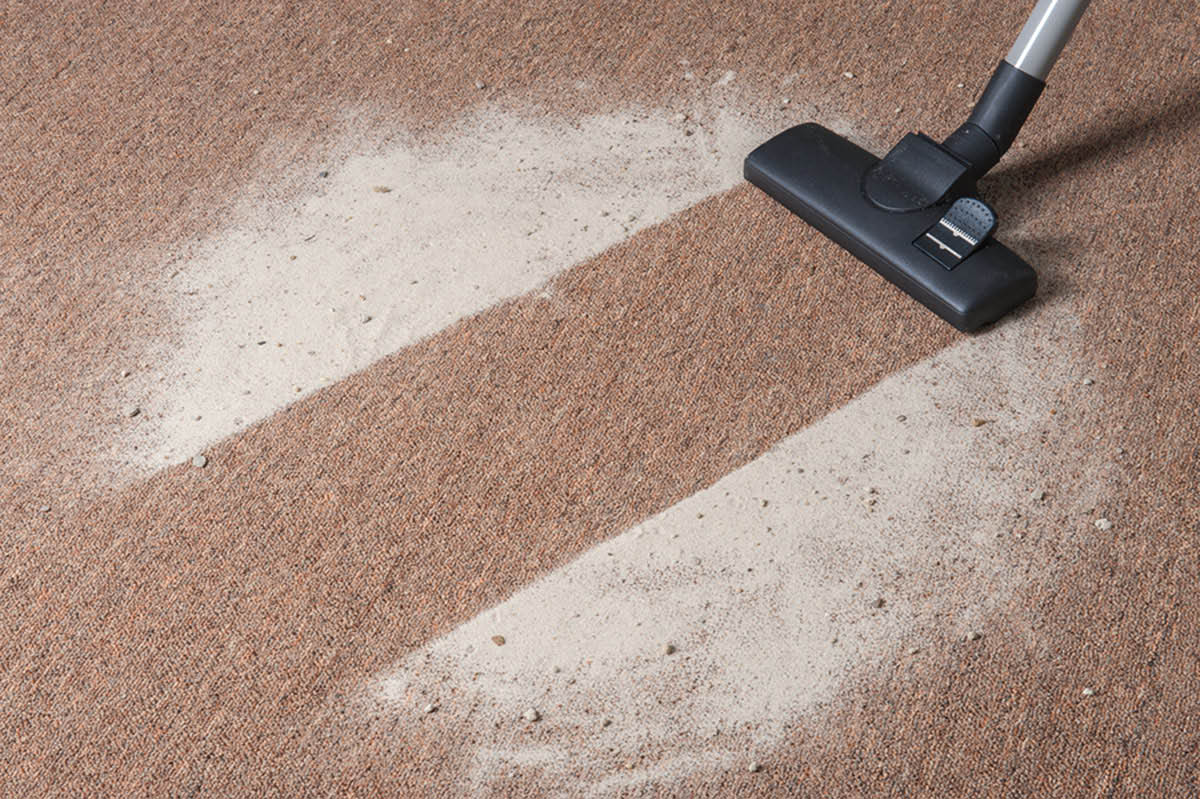 vacuuming carpet