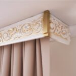 white carved cornice