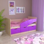 purple baby bed with protective sides