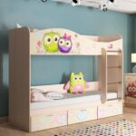 baby bed with decor from owls