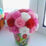 napkin carnations in a vase